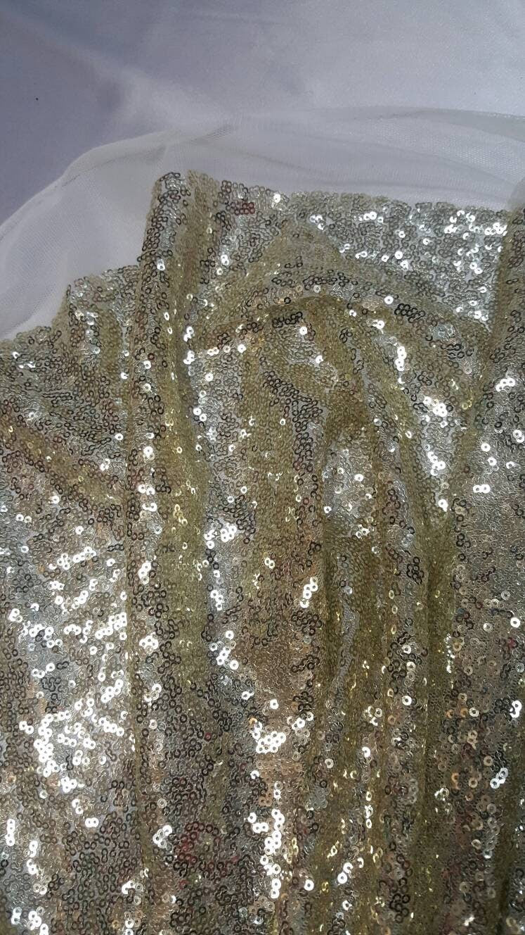 Light Gold Sequin on White Mesh 1 Way Stretch Fabric Sold by the Yard Draping Party Decoration Clothing 60 Inch W Glitz Gold Sequin