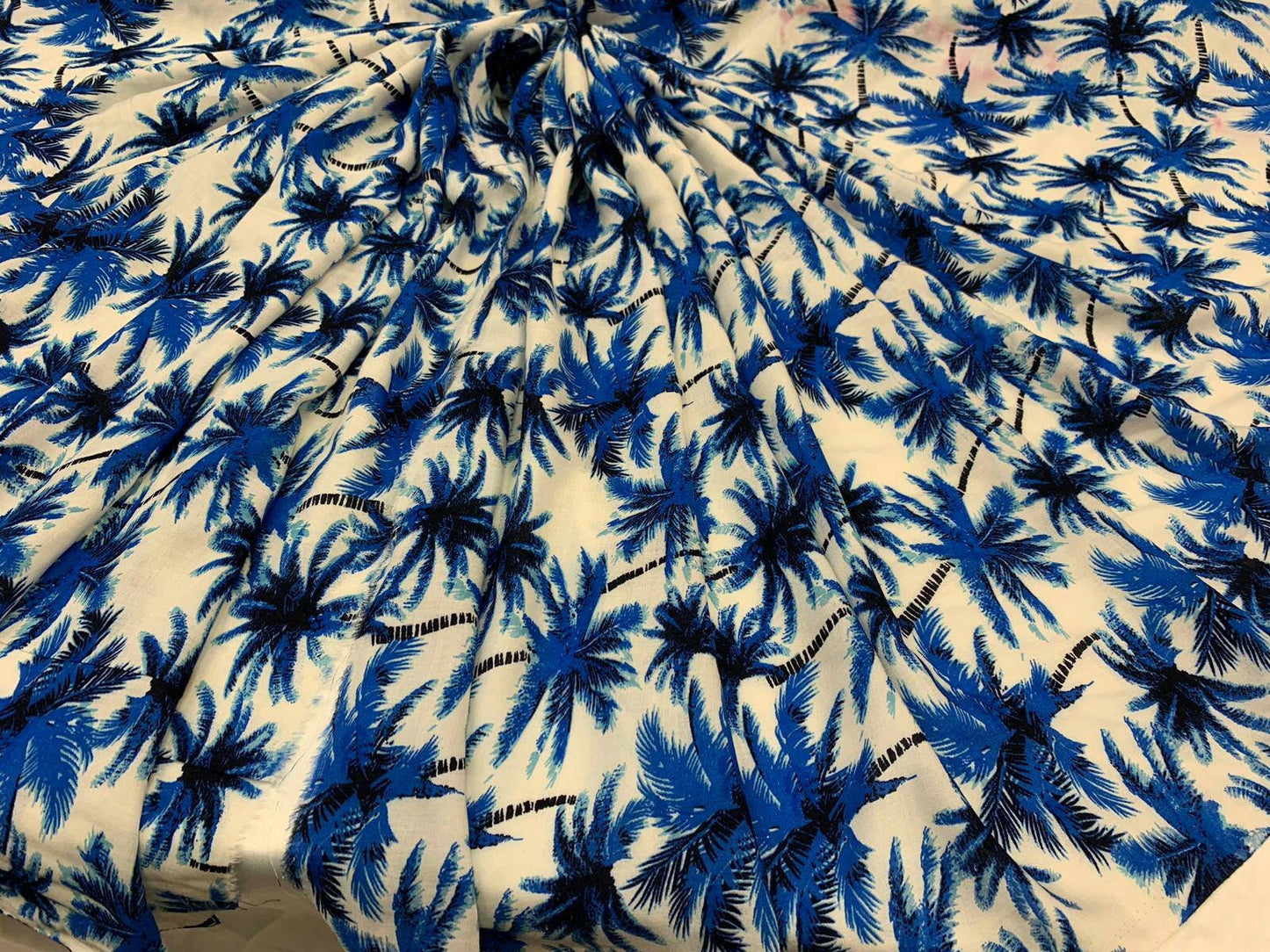Rayon chally with off white background and blue palmtrees tropical fabric sold by the yard clothing dress decoration organic kids