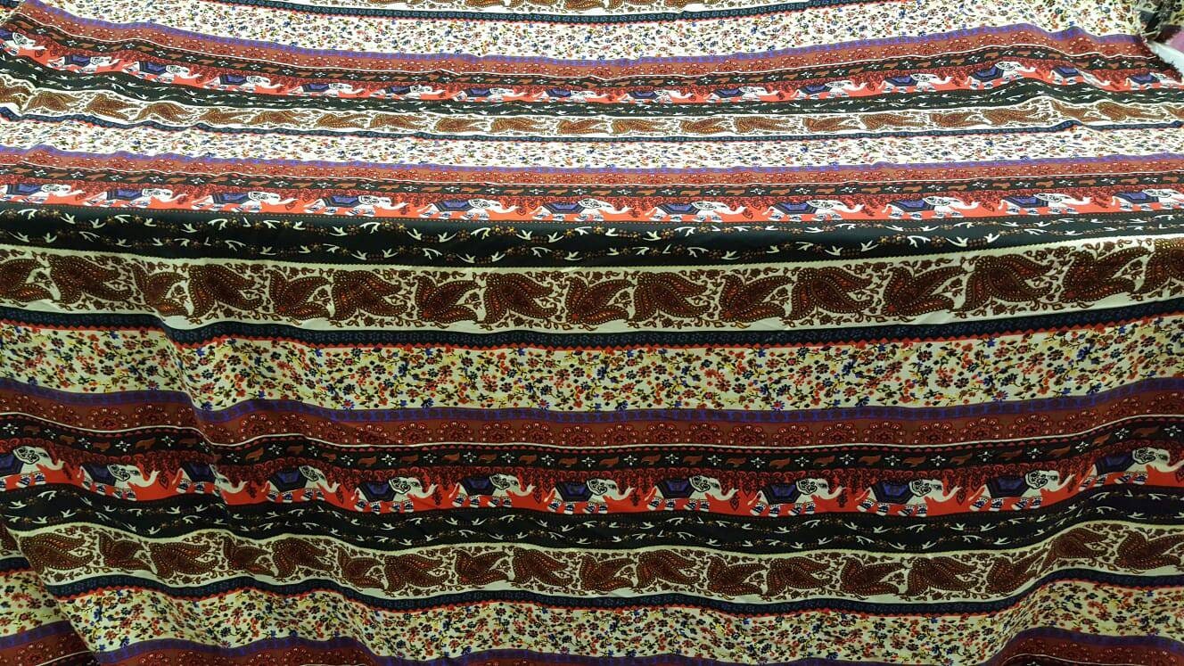 100% rayon challis small flower print elephant Indian inspiration Fabric by the yard 58 inches wide soft flowy multicolor