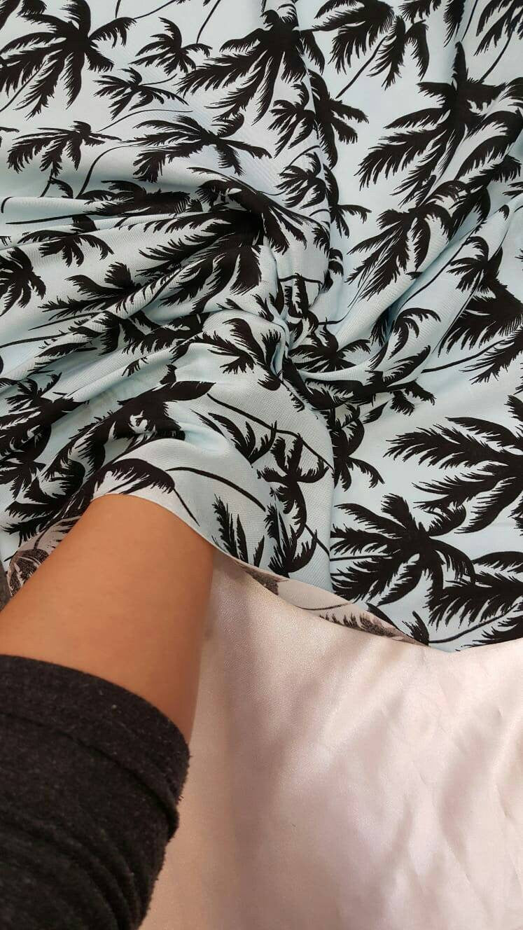 100% Rayon challis black Palm tree on baby blue background