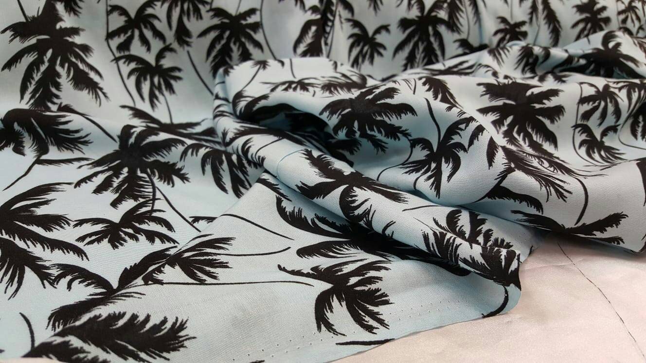 100% Rayon challis black Palm tree on baby blue background