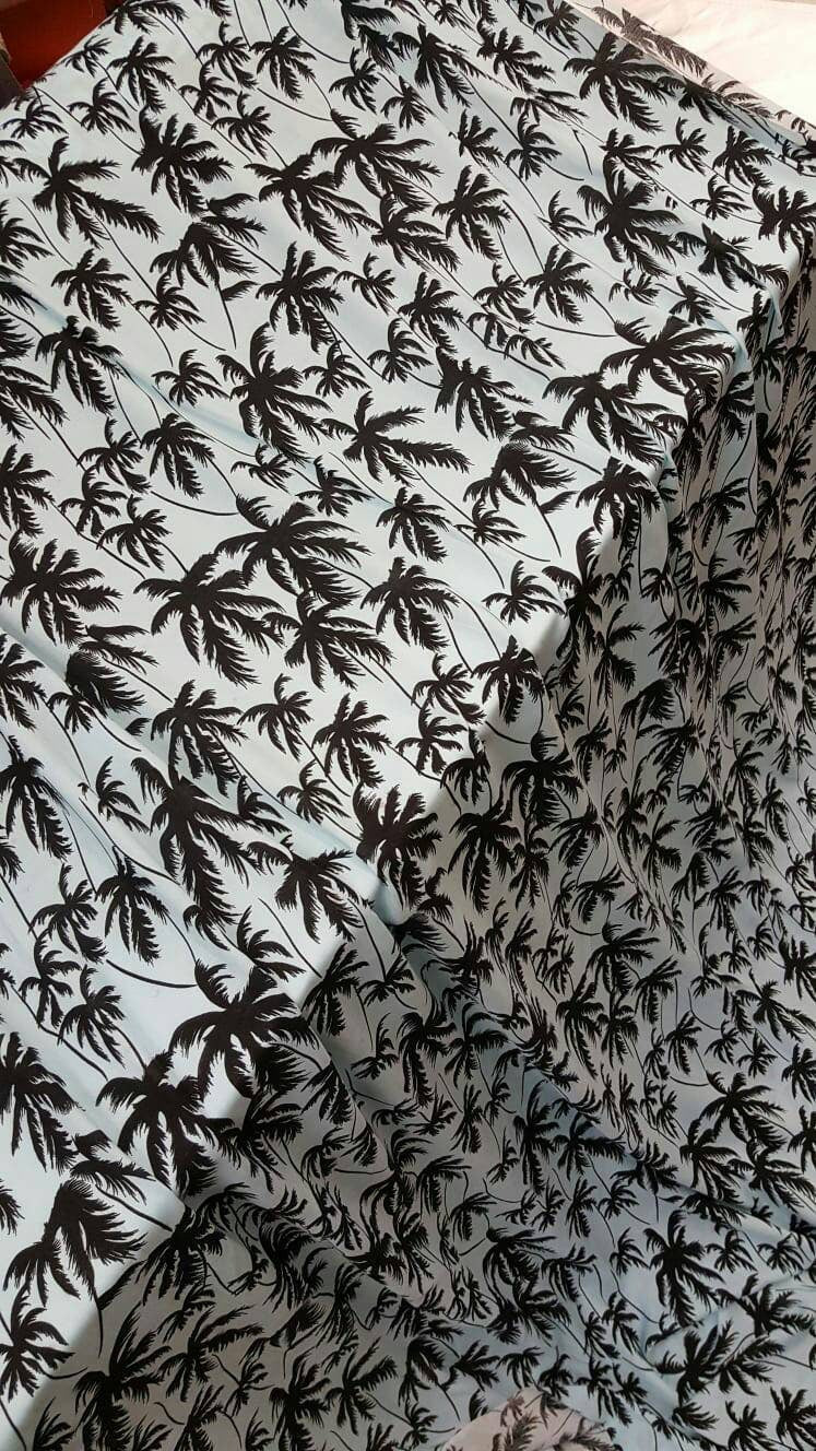 100% Rayon challis black Palm tree on baby blue background