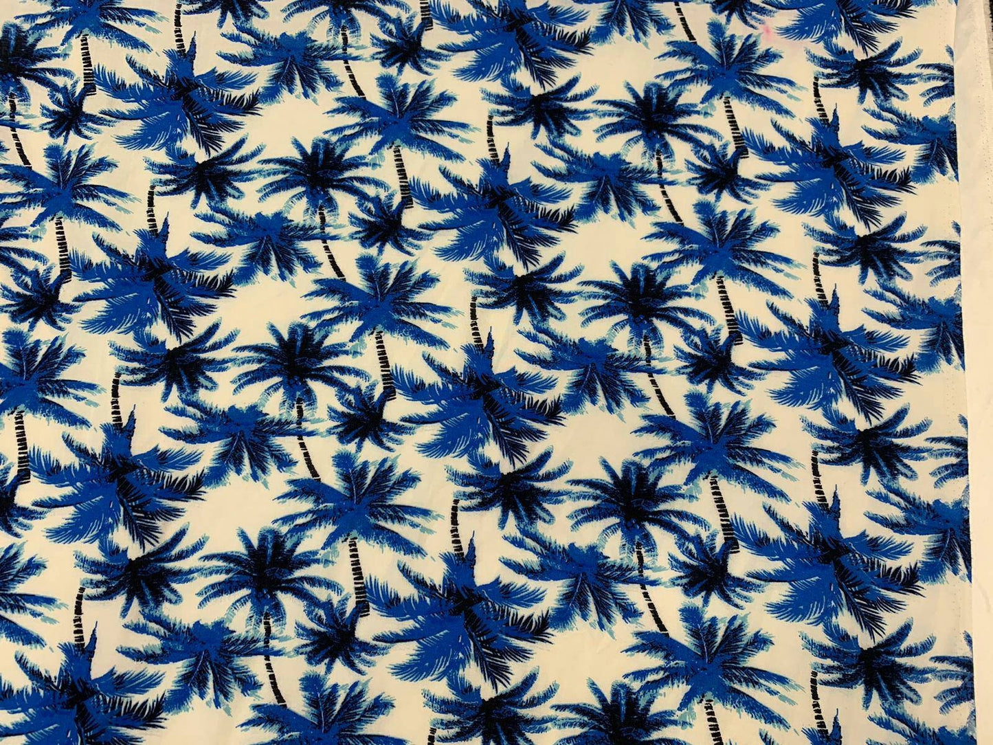 Rayon chally with off white background and blue palmtrees tropical fabric sold by the yard clothing dress decoration organic kids