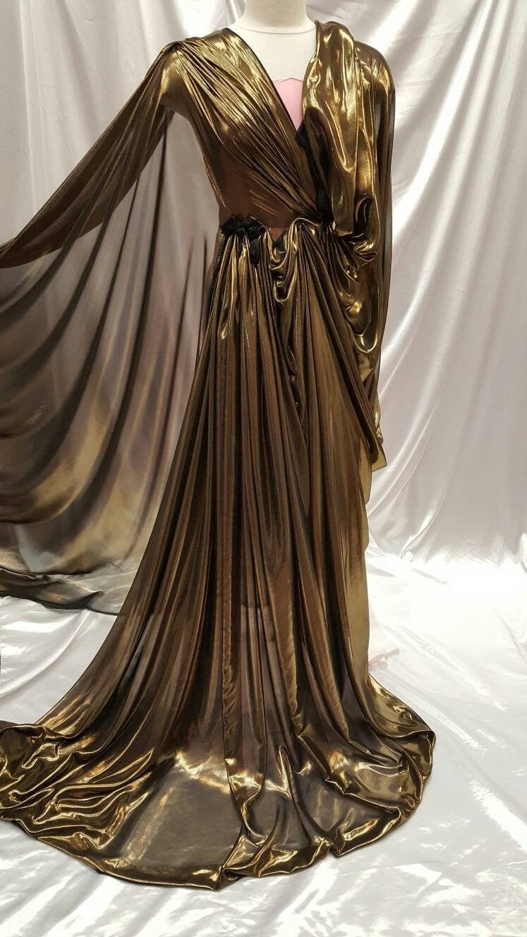 Gold Metallic Chiffon Silk Black Background Soft Flowy Prom Fabric Sol GENERAL TEXTILES INC DBA SMART FABRICS Gold Metallic Chiffon Silk Black Background Soft Flowy Prom Fabric Sol GENERAL TEXTILES INC DBA SMART FABRICS