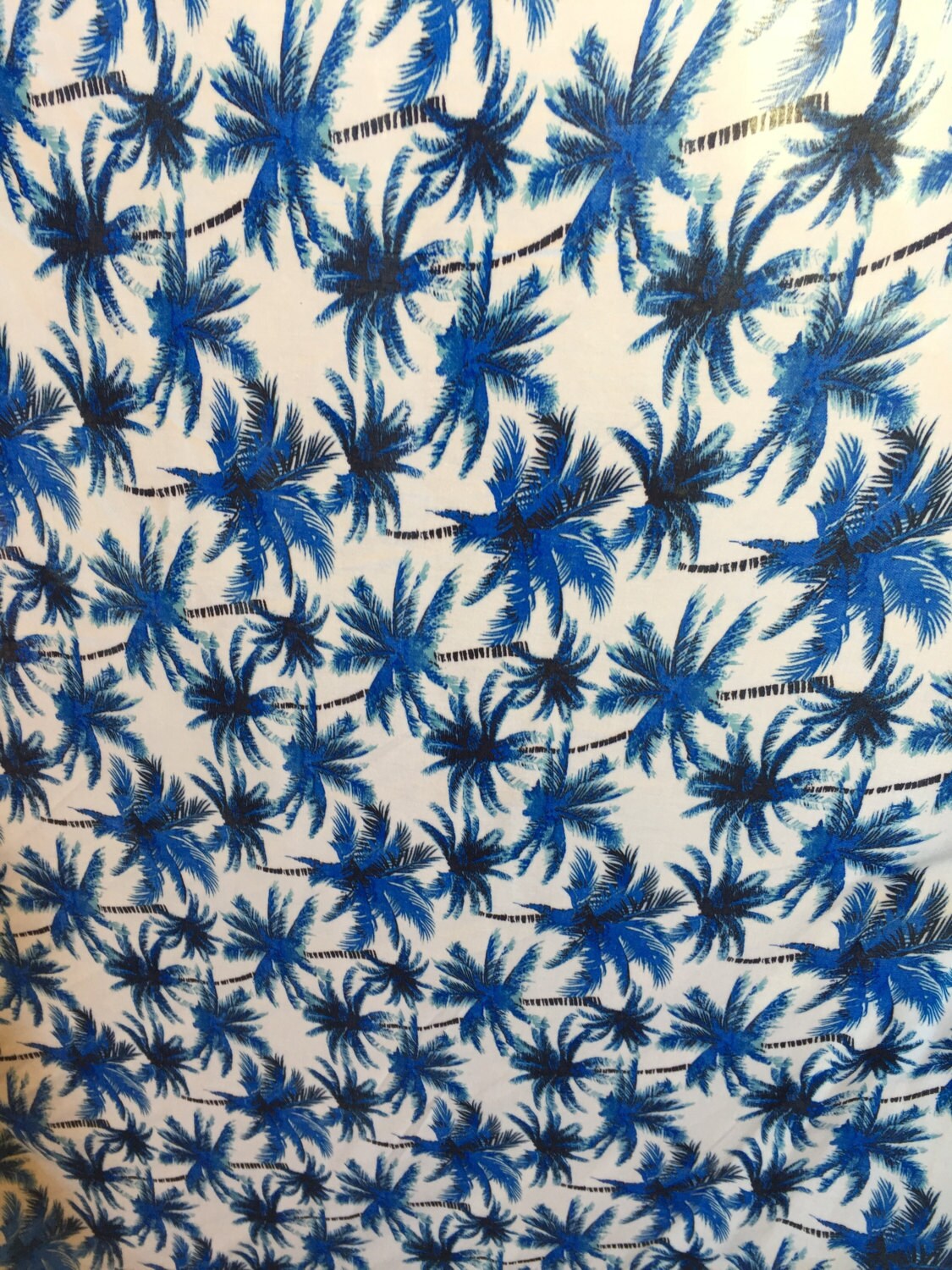 Rayon chally with off white background and blue palmtrees tropical fabric sold by the yard clothing dress decoration organic kids