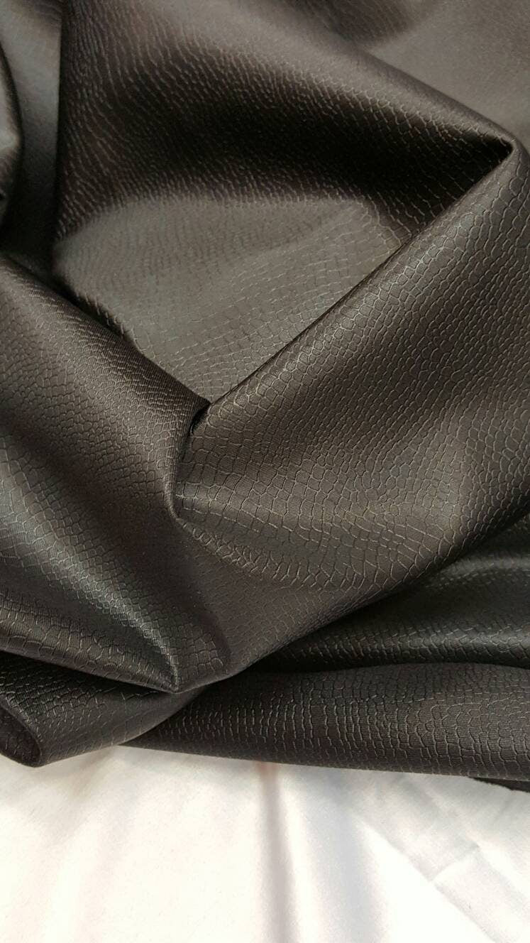 Black Stretch Vinyl Fabric: Versatile and Stylish Material for Your Creations