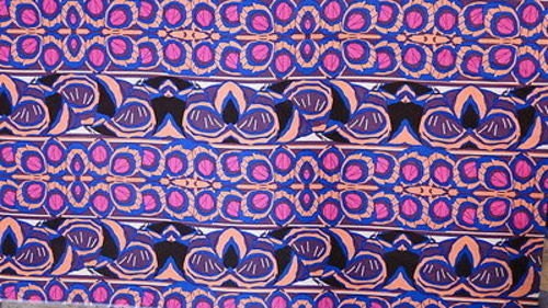 100% Rayon. Tropical Inspired Print with Hues of Fuchsia, Blue, Brown and Black Hues. 58-60 Inches Wide Sold by the Yard