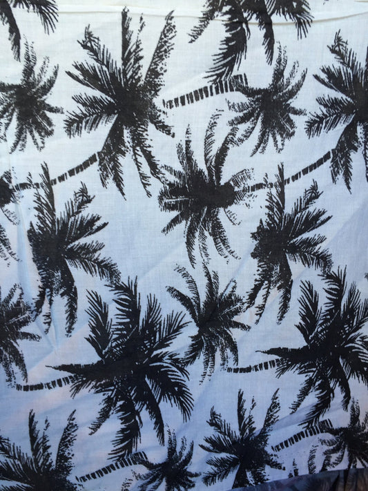 100% Rayon chally with off white background and black palmtrees