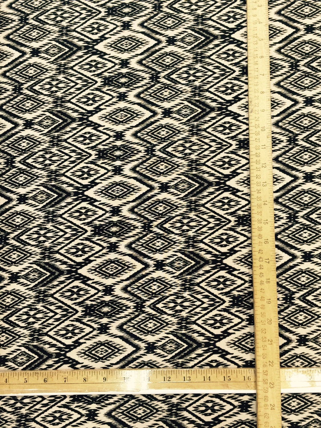 100% Rayon Challis. Black and Tan Geometric Pattern. Fabric by the