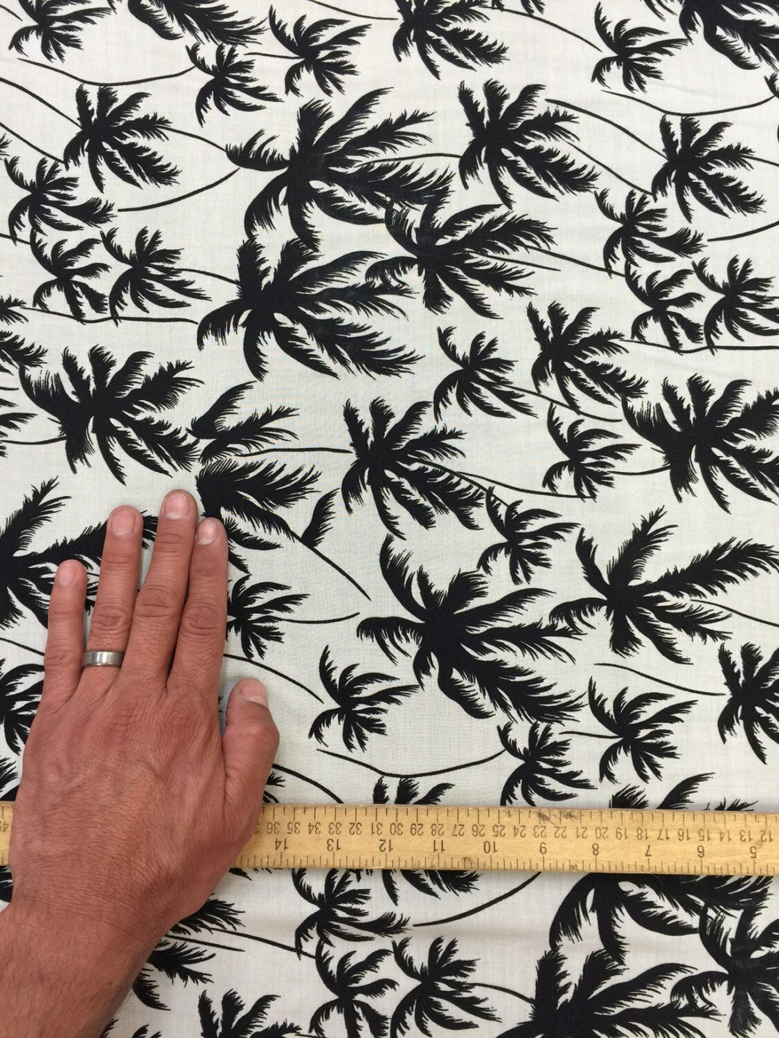 100% Rayon Challis Off white background w Black palm trees. Fabric sold by the yard soft organic kids dress draping clothing decoration