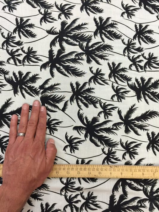 100% Rayon Challis Off white background w Black palm trees. Fabric sold by the yard soft organic kids dress draping clothing decoration